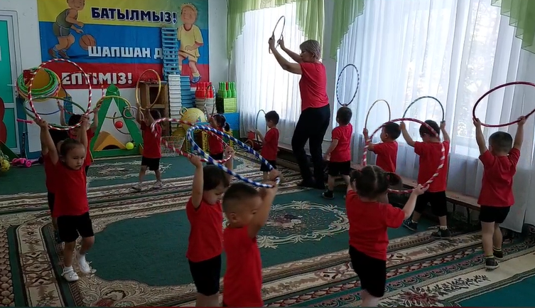 Таңертеңгілік жаттығу "Күншуақ" ортаңғы тобы Тәрбиеші Наурызбаева Ж.Қ.